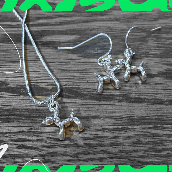 Dainty silver 1/2" balloon dog charms on earring hooks and a snake chain necklace