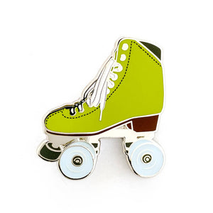 Green roller skate pin with glow in the dark wheels